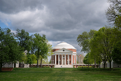 The Rotunda surrounded by leaving trees with the Lawn in foreground